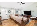 Bright living room featuring hardwood floors, a comfortable sectional sofa, and a ceiling fan at 1649 Lauda Dr, Mount Pleasant, SC 29464