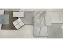 Selections from the design center include flooring, backsplash, countertop, and cabinet samples at 207 Abercom Place Dr, Moncks Corner, SC 29461