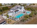 Stunning aerial view of the property with a pool and surrounding landscape at 2123 Boatwright Rd, Johns Island, SC 29455
