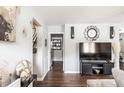 Bright living room with wood floors and modern decorative accents at 2916 Marginal Rd, Charleston, SC 29414