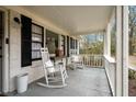 Cozy porch featuring rocking chairs and ample space for relaxation, perfect for enjoying the outdoors at 3589 Walter Dr, Johns Island, SC 29455
