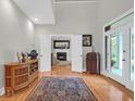 Elegant entryway with hardwood floors, transitional decor, and an open doorway to the living area at 652 E Hobcaw Dr, Mount Pleasant, SC 29464