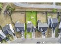Aerial view of a suburban neighborhood featuring fenced backyards and tree-lined streets at 1052 Whitlow Blvd, Summerville, SC 29483