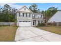 Charming two-story home with a two car garage and a well maintained yard at 150 Rockingham Way, Moncks Corner, SC 29461