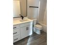 Bathroom featuring white vanity with black hardware, toilet, and shower at 3004 Harvey Ave, North Charleston, SC 29405