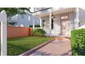 Charming two-story home with a well-kept front yard and inviting entryway at 80 Smith St, Charleston, SC 29401