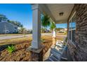 View from the porch with rocking chairs at 2734 Sunrose Ln, Johns Island, SC 29455