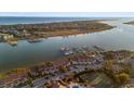 Beautiful aerial view of waterfront condos with marina, tennis court, and stunning waterfront views at 46 Mariners Cay Dr, Folly Beach, SC 29439