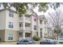 Inviting condo building boasts classic design and a welcoming facade at 700 Daniel Ellis Dr # 13302, Charleston, SC 29412