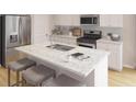 Modern kitchen featuring stainless steel appliances, a breakfast bar, and ample counter space for culinary enthusiasts at 118 Threaded Fern St, Summerville, SC 29485