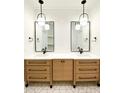 Modern bathroom with double vanity, stylish mirrors, and hexagon tile floor at 1468 Alligator Creek Ct, Awendaw, SC 29429