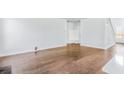 A spacious living room with beautiful hardwood floors and ample natural light at 201 Seele St, Lincolnville, SC 29485