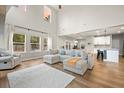 Spacious living room with views of the kitchen, dining area, and backyard at 217 Lucca Dr, Summerville, SC 29486