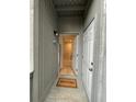 Welcoming entryway featuring a modern white door, a 'Welcome' mat, and light wood floors at 291 Sea Cloud Cir # 291, Edisto Island, SC 29438