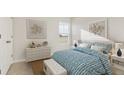 Bright bedroom featuring nautical decor, white furniture and blue patterned bedding at 310 Tiliwa St, Summerville, SC 29486