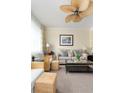 Cozy living room with comfortable seating, decor, and lots of natural light at 5800 Palmetto Dr # Vg-105, Isle of Palms, SC 29451