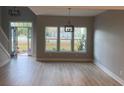 Bright living room with a view to the outside through large windows, showcasing ample space and natural light at Ln, Walterboro, SC 29488