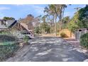 Long driveway and a shed adding storage and functionality to the property at 108 Tea Farm Rd, Summerville, SC 29483
