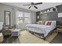 Bright bedroom with a large window, stylish decor, and comfortable furniture at 214 Terry Ave, Summerville, SC 29485