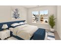 Inviting bedroom with a plush bed, serene decor, and bright natural light at 202 Belfort Pl, Summerville, SC 29486