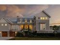 Charming exterior with elegant landscaping and a welcoming entryway adorned with climbing vines at 3001 Marshall Blvd, Sullivans Island, SC 29482