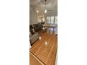 Comfortable living room with hardwood floors and a neutral color palette, creating a warm and inviting atmosphere at 7646 Kinston St, North Charleston, SC 29418