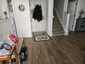 Inviting entryway with wood flooring, coat hooks, and staircase leading to the upper level at 110 Greyson Cir, Goose Creek, SC 29445