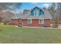 Brick home with manicured lawn, showcasing the home's exterior and curb appeal at 131 Londonderry Rd, Goose Creek, SC 29445