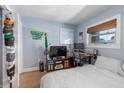 Cozy bedroom with a comfortable bed, work desk, and natural light, ideal for relaxation and study at 40 Bee Street # 314, Charleston, SC 29403