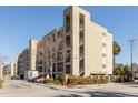 Attractive mid-rise condominium featuring balconies, concrete construction, and ample parking in a secure location at 40 Bee Street # 314, Charleston, SC 29403