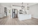 Modern kitchen with stainless steel appliances and a spacious island at 422 Queenview Ln, Charleston, SC 29414