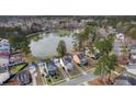 Quiet residential neighborhood surrounding a peaceful lake, showcasing tree-lined streets at 8957 N Red Maple Cir, Summerville, SC 29485