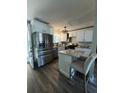 Modern kitchen featuring stainless steel appliances, white cabinets, and a marble island at 116 Lyle Rd, Goose Creek, SC 29445