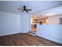 Bright living room showcasing open floor plan with hardwood floors and modern finishes at 338 Holly Ave, Goose Creek, SC 29445