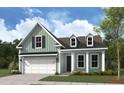 Inviting one-story home featuring green siding, a garage, black accents, and a charming covered entry at 512 Eagleview Dr, Moncks Corner, SC 29461