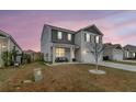 Beautiful home with gray siding, and a well-kept lawn, creating a welcoming curb appeal at 543 Wayton Cir, Moncks Corner, SC 29461
