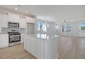 Modern kitchen featuring a center island, stainless steel appliances, and ample cabinet space at 722 Rumbling Leaf Ln, Summerville, SC 29486
