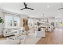 Bright and airy living room featuring hardwood floors, neutral decor, and an open layout at 360 Citrus Dr, Summerville, SC 29486