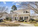 Attractive townhouse with a welcoming entrance, tidy landscaping, and a side yard visible on a sunny day at 4850 Habersham Ln, Summerville, SC 29485