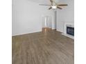 Spacious living area features a fireplace, vaulted ceiling with fan, and plenty of natural light at 5509 Copper Trce, North Charleston, SC 29418