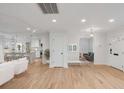 Open-concept layout showcasing the kitchen, living area, and modern design at 704 N Godfrey Park Pl, Charleston, SC 29407