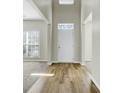 Bright entryway with high ceilings and views into the living spaces at 9620 Pebble Creek Blvd, Summerville, SC 29485