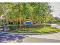 Community entrance sign for Mira Vista surrounded by lush landscaping and mature trees at 1433 Telfair Way, Charleston, SC 29412