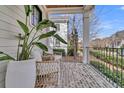 Cozy porch features brick flooring and comfortable seating area at 213 Amberjack Ln, Charleston, SC 29492