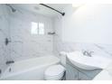 Updated bathroom with marble tile and modern fixtures at 117 Roberts Rd, Summerville, SC 29483
