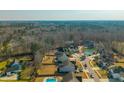 Aerial view of a residential neighborhood featuring well-maintained homes and lush landscaping at 136 Stagecoach Ln, Summerville, SC 29483