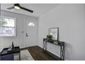 Bright living room with console table and view of the front door at 2218 Dover St, North Charleston, SC 29405