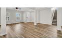 Bright and airy living room showcasing hardwood floors and neutral decor at 105 Waylon Dr, Summerville, SC 29483