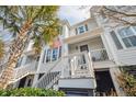 Charming coastal exteriors with stair access and an inviting feel at 1614 Prince Edward St, Mount Pleasant, SC 29466