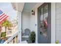 Charming front porch with seating and coastal decor, perfect for enjoying the outdoors at 1614 Prince Edward St, Mount Pleasant, SC 29466